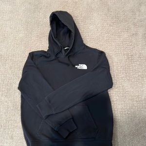 North Face hooded sweatshirt black w white chest logo and red back logo. Medium